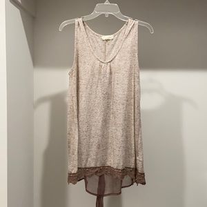 Large sleeveless top with see through back